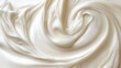 © Jane Kelly - Milk background. Yogurt. Sour cream swirl texture