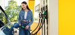 © Home-stock - Woman refilling auto with bio fuel at modern petrol station. Eco friendly and convenient car care, automobile fueling offer concept