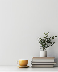 Minimalist indoor plant decor with a white pot and stacked books, creating a fresh and clean atmosphere perfect for modern and contemporary home interiors