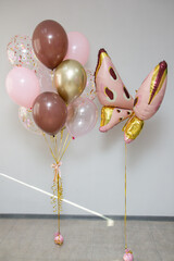 pink butterfly balloon on white background