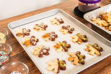 Canvas Print - Making Holiday Star Cookies, Chocolate-Dipped with Pistachio Topping