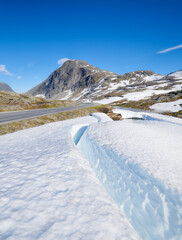 Wall Mural - Nature in Norway. Panoramic view of wild Norway. Rocks and mountains. Bright sunshine in the daytime. a place for traveling. Vacation and travel in summer Norway.