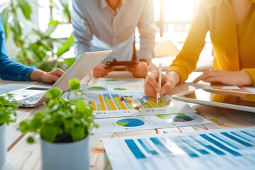 Canvas Print - Business Team Analyzing Financial Charts and Data.