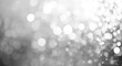 © Anton - White Bokeh. Abstract Blurred White and Gray Background with Defocused Bokeh Lights
