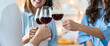 © Yingyaipumi - Cheerful middle aged friends enjoying home Birthday holiday party. Asian Friends cheering drinking red wine celebrating Christmas or New Year party.