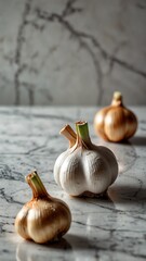 Canvas Print - garlic on luxurious white marble table countertop in kitchen background ad concept copy space