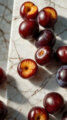 Canvas Print - plums on luxurious white marble table countertop in kitchen background ad concept copy space