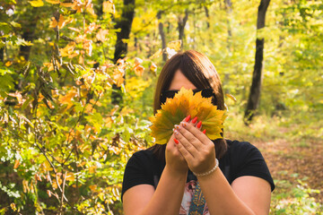 Wall Mural - Girl in the autumn forest