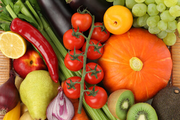 Wall Mural - Different fresh fruits and vegetables in basket, top view