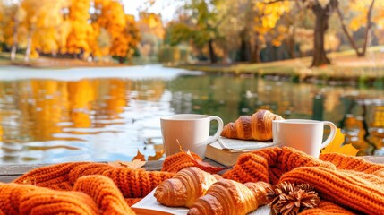 Wall Mural - an orange blanket on the edge of a lake