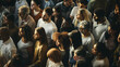 © VK Studio - A large and diverse crowd of people standing closely together, captured in soft natural light, creating a mosaic of various expressions and perspectives.