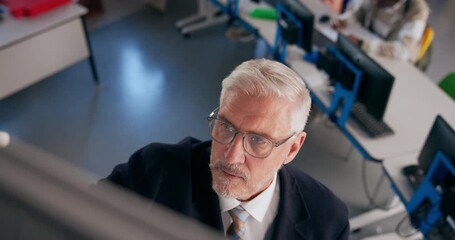 Poster - Professor, man and writing on board for teaching, curriculum and learning in top view. Mature lecturer, information or education in college with students on computer for IT, software or coding lesson