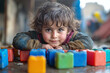 © Infinity Lens - Photograph of a Refugee Child Playing with Makeshift Toys: Capturing moments of innocence.
