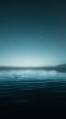 Wall Mural - a view of the ocean at night with stars in the sky