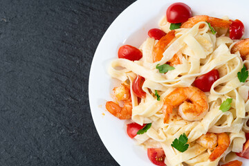 Canvas Print - Italian pasta with shrimps , parmesan and tomatoes