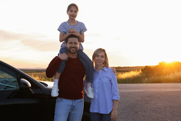 Sticker - Happy parents and their daughter near car outdoors, space for text