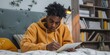 © Brian - Gen Z student teenager doing homework in bedroom