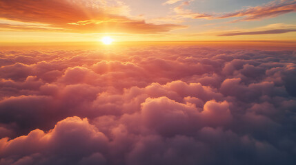 Wall Mural - Beautiful sunset sky with pink fluffy clouds view from above 