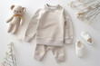 © Colinekot - Kids sweatshirt, pants, shoes and teddy bear laying on white background. Kids wear mockup, flat lay