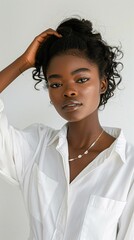 Wall Mural - portrait of black woman in white shirt