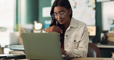 Poster - Indian woman, employee and glasses in office with laptop for typing ideas and information as market research specialist. Female person, confident and smile on website or online work for solution
