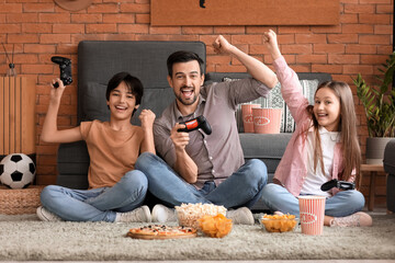 Poster - Father with his little children playing video game at home