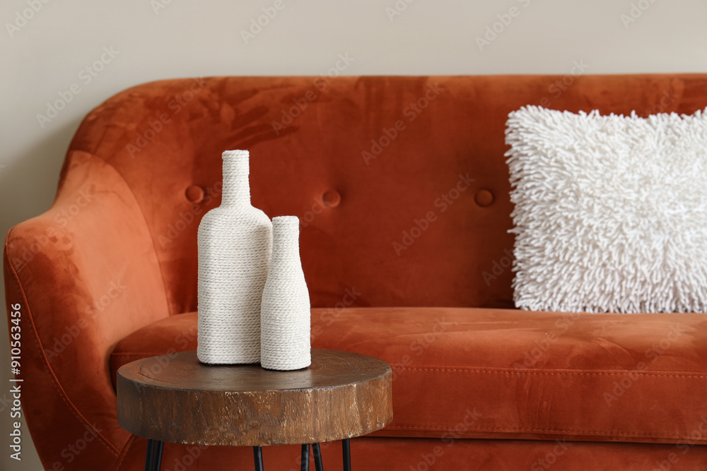 Modern interior of living room with cozy sofa and coffee table