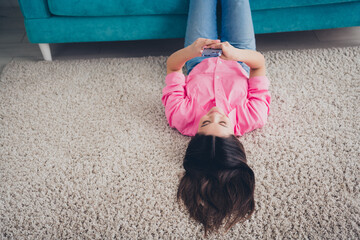 Wall Mural - Photo of pretty cheerful lady wear pink shirt communicating modern gadget indoors room home house