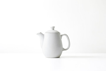 Sticker - White teapot on white background