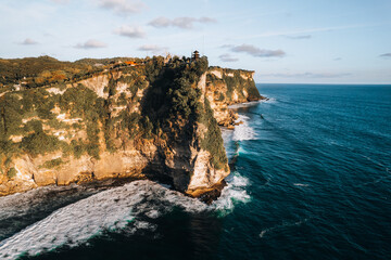 Wall Mural - Aerial photo of Uluwatu temple, tourist and travel site in in Bali, Indonesia