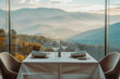 © Warunporn - table setting in a Elegant table setup glasses of champagne drinks and cutlery with a stunning view luxury restaurant. Romantic dinner with panoramic mountain view. Romance date on vacatstaurant
