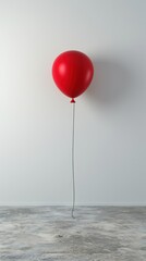 Wall Mural - a single red balloon on the white wall copy space.