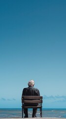 Wall Mural - old man sitting alone , retirement conceptual image, minimalist, beautiful, centered,