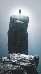 Wall Mural - silhouette of person standing on the top of mountain.