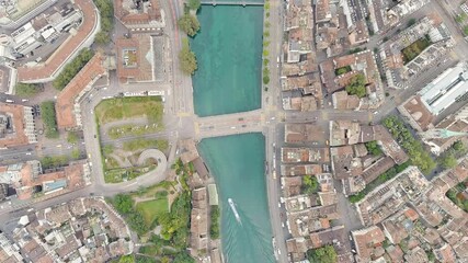 Wall Mural - Zurich, Switzerland. Pleasure boat on the Limmat River. Summer day, Aerial View, HEAD OVER SHOT