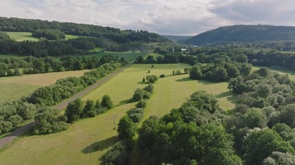 Wall Mural - czech landscape full of forests, fields, meadows and hills. summer in central europe from an aerial 