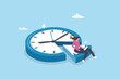 © Nuthawut - Part-time job, work tracking system, day planning or time management, side hustle or office work deadline, start and end time schedule concept, businesswoman working with laptop on split time clock.