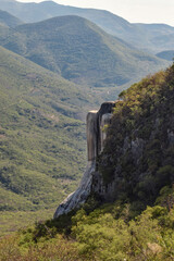 Wall Mural - Hierve el Agua. Petrified waterfall and mountains in Oaxaca, Mexico