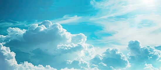 Sticker - Scenic view of a blue sky with fluffy white clouds in a copy space image