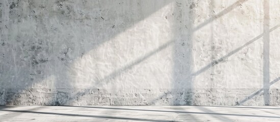 Poster - Empty exterior concrete wall with sunlight reflection texture providing a white paint room background with a rough surface ideal as a backdrop for product presentations featuring light and shadow ami