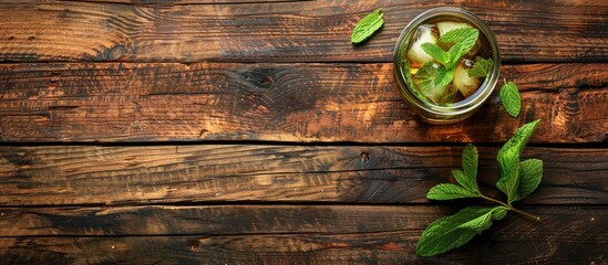 Aufkleber - A rustic wooden background sets the scene for a traditional Moroccan drink featuring summer iced mint tea with room for a copy space image