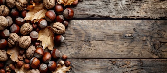 Wall Mural - Healthy concept with hazelnuts and nuts arranged beautifully on a wooden table perfect for a copy space image