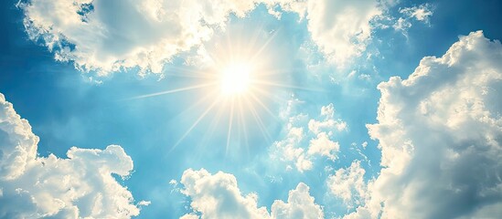 Poster - Sunny day with blue skies and white clouds offer an abstract background for a copy space image