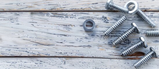 Canvas Print - Metal screws for wood on white wooden backdrop for construction Includes copy space image for text