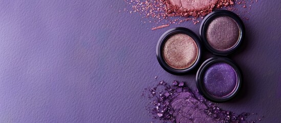 Poster - Three eye shadows on a purple backdrop with a free copy space image