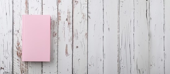 Sticker - Background of white wooden plank pink paper notepad features copy space image for text