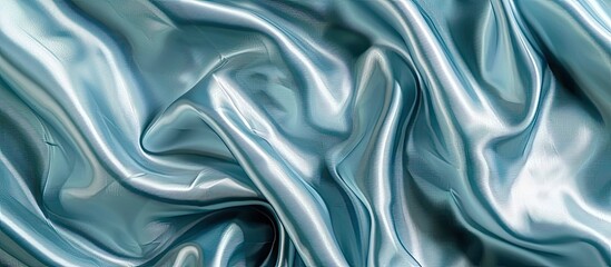 Aufkleber - Silk fabric with a blue nacre wave pattern creates an abstract texture on a horizontal background with ample copy space image