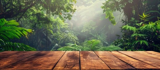 Poster - A wooden table with space for product placement against a lush green forest background providing a copy space image for advertising