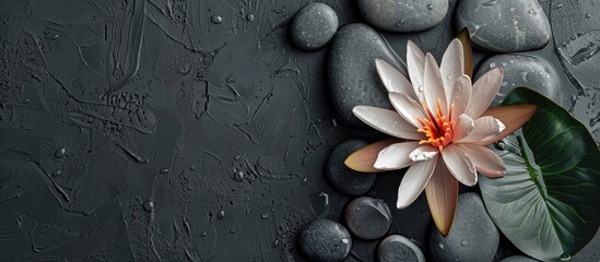 Sticker - Gray background with spa stones and a flower perfect for a copy space image