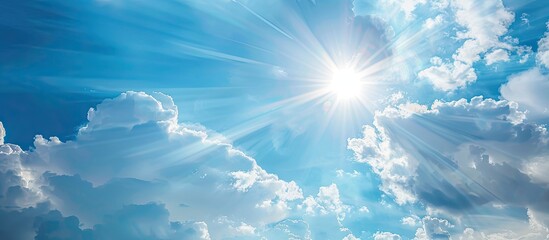 Wall Mural - natural beauty portrayed in an abstract backdrop of a blue sky with white clouds and a sunlit effect
